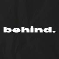 Behind